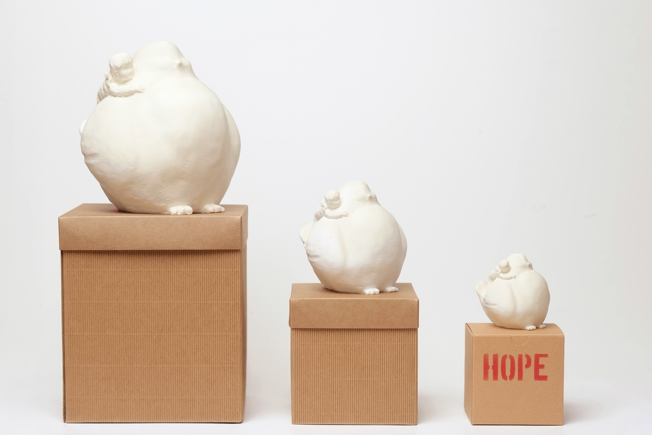 The HOPE sculpture in three sizes: L, M, S